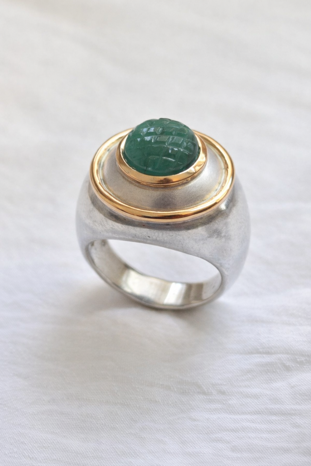 R822SKG - Sterling Silver with 18K Gold, and Carved Emerald